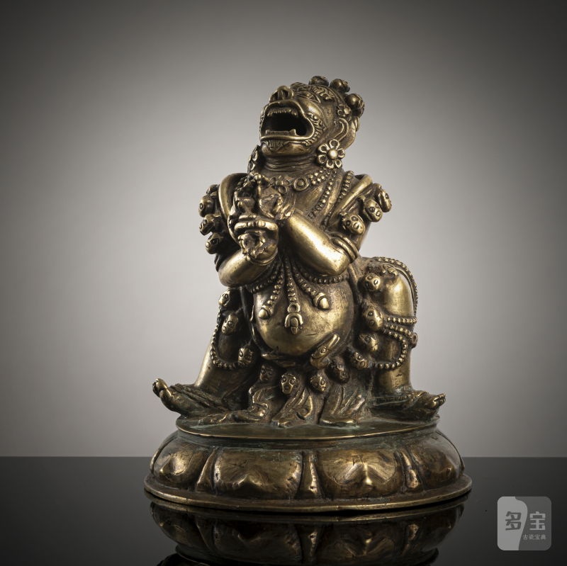 A BRONZE FIGURE OF DHAKA